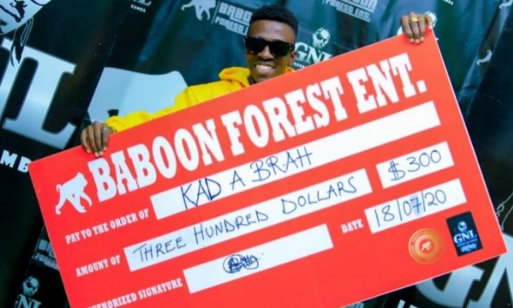 Kadabrah poses for a photograph with the GNL Dear HipHop Challenge winner's cheque. Photo: Gats MC