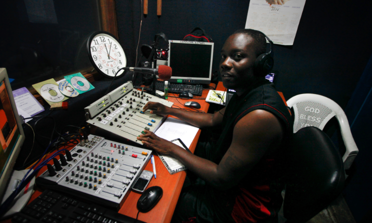 Elliott Adekoya, aka The Milkman, working at Monrovia's Sky FM in 2014. Photo: NPR