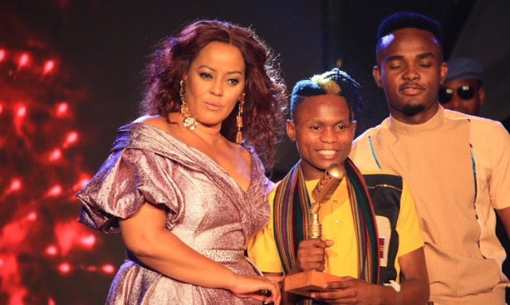 Bongo Star Search patron and chief judge Rita Paulsen and 2019 winner Meshack Fukuta.