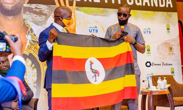 Minister for Tourism, Wildlife and Antiquities Godfrey Kiwanda and Eddy Kenzo.