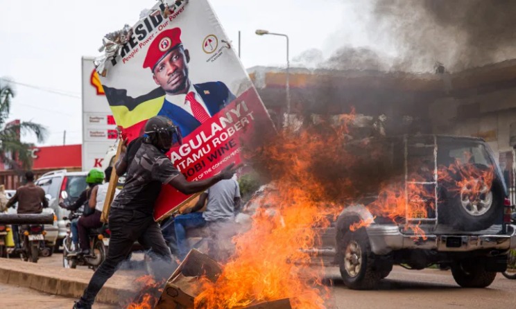 A supporter of Bobi Wine during a street protest after his arrest. Photo: Badru Katumba