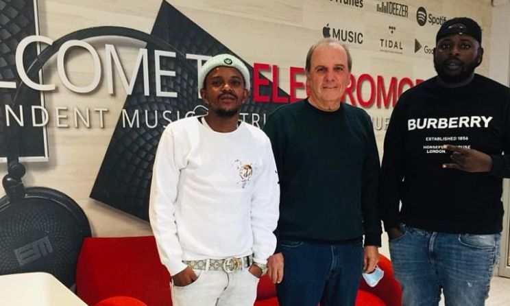 Electromode managing director Chris Ghelaki flanked by Kabza De Small and DJ Maphorisa.
