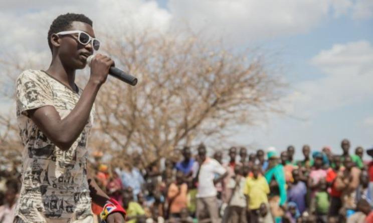 A rapper taking part in a talent show at Kakuma Refugee Camp. Photo: Ruairi Casey