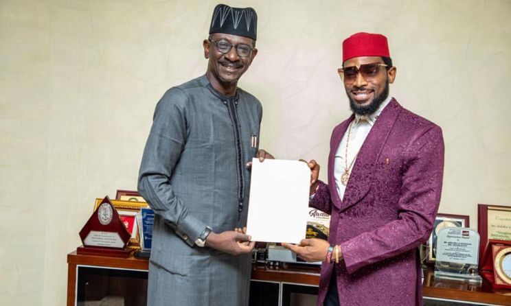 NEXIM boss Abubakar Bello poses with D'banj at a ceremony announcing the musician as its latest brand ambassador.