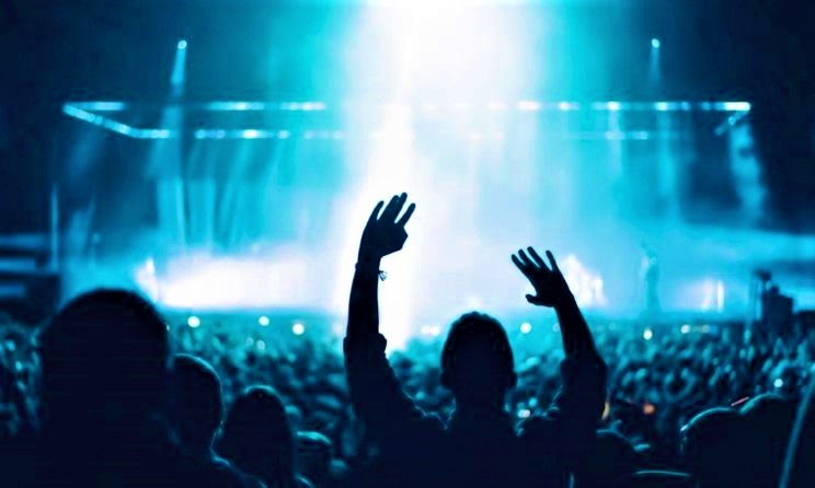 Some entertainment companies in the US are requiring concertgoers and staff to be fully vaccinated before attending events.