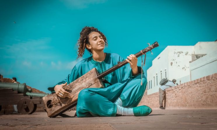 Moroccan guembri player Hind Ennaira is among the participants of the OneBeat Sahara Festival and Exchange programme. Photo: Facebook