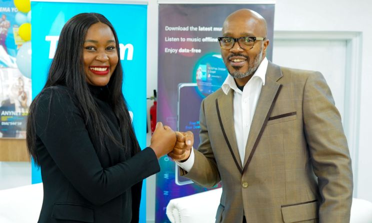 Boomplay East Africa managing director Martha Huro and Telkom marketing director Eric Achola.