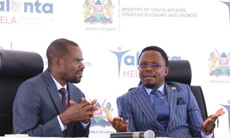 Kenya Cultural Centre CEO Michael Pundo and the cabinet secretary at the Ministry of Youth Affairs, Creative Economy and Sports Ababu Nambwamba during the unveiling of the nominees at Talanta Plaza in Nairobi on 23 January 2024.