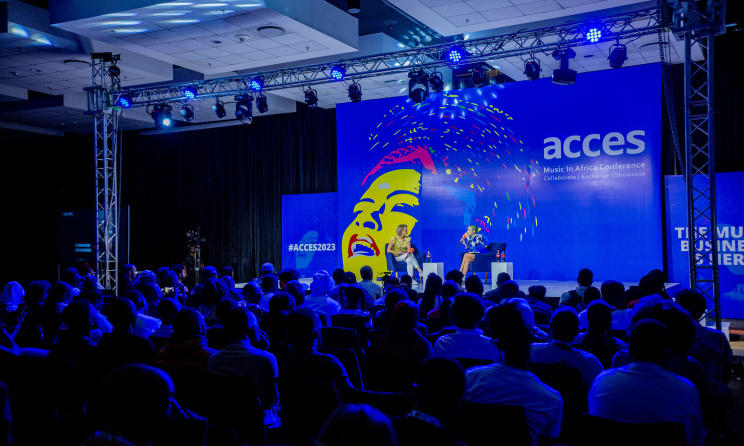 A conference session at ACCES 2023 featuring VOA’s Heather Maxwell and Sho Madjozi. Photo: Infocus