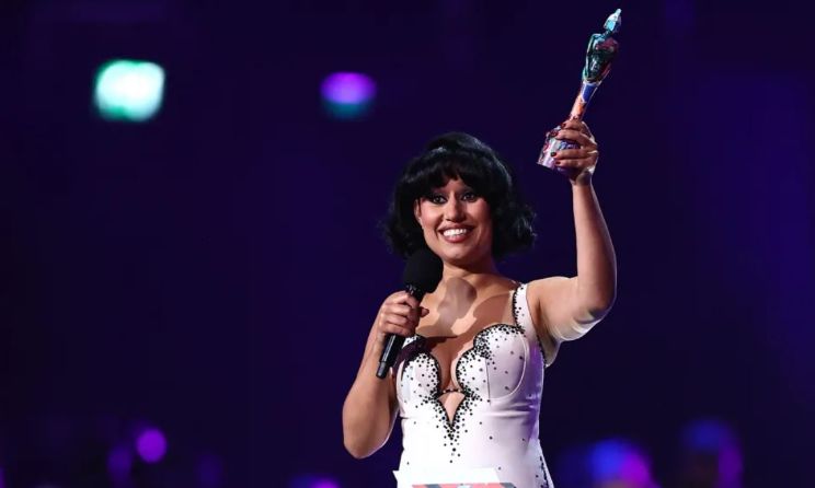 British singer RAYE, born to a Ghanaian-Swiss mother and English father, emerged as the night’s biggest winner, scooping six awards out of a possible seven.