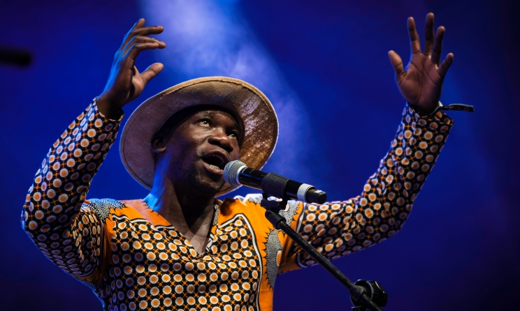 Mokoomba frontman Mathias Muzaza performing at the MTN Bushfire festival in eSwatini as part of the CollaboNation project that was supported by the Sound Connects Fund. Photo: Bram Lammers