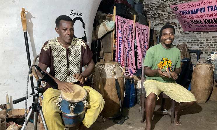 Odomankoma Kyerema Kwamena Pra and his son, Frank Kobina Pra, performing at their rehearsal space in the Cape Coast Castle, Cape Coast. Photo: Stefan Schneider