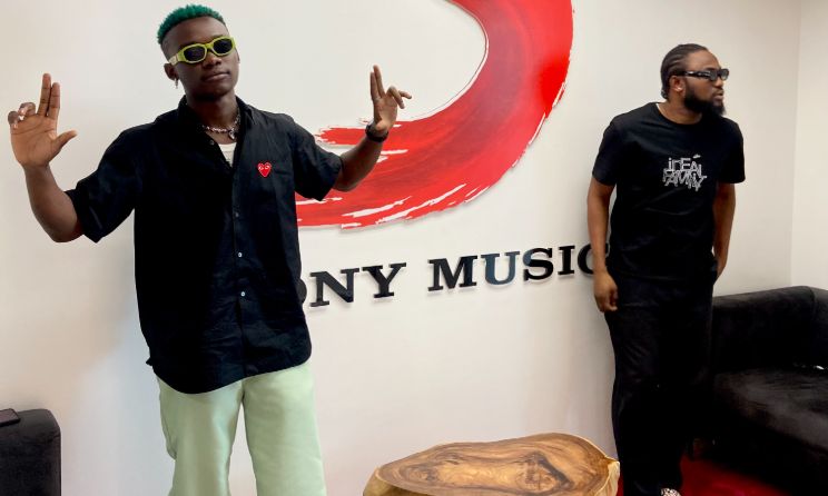 Ghanaian artist OliveTheBoy and road manager Hackim “Demzy” Assi.
