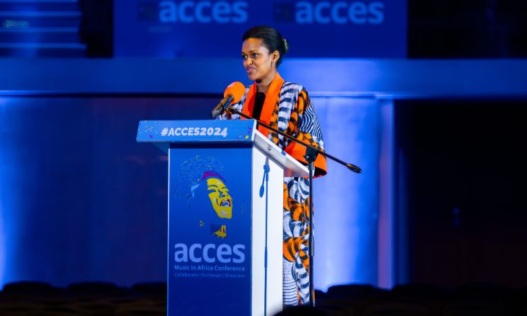 Rwandan Minister of State for Youth and Arts Honourable Sandrine Umutoni addressing delegates at ACCES 2024 in Kigali.