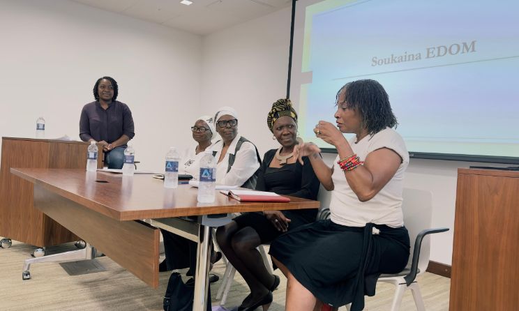 Panellist Tariro Negitare (musician) leading a panel discussion featuring veteran artists Agnes Nyanhongo (sculptor), Joyce Jenje Makwenda (music archivist and journalist), Virginia Phiri (writer) and Soukaina Edom (dance instructor).