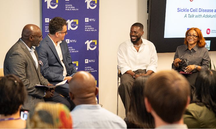 Nigerian artist Adekunle Gold (second from right) visited NYU School of Global Public Health to launch a research collaboration, BEAT-SCD. He spoke with NYU professors Emmanuel Peprah (left) and Carlos Chirinos (second from left), along with Elizabeth Sobowale (right) of the Adekunle Gold Foundation. Photo: NYU Photo Bureau