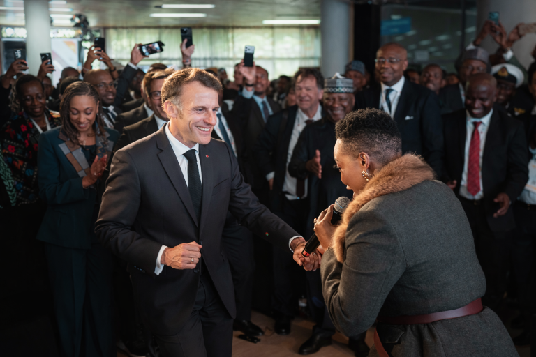 French President Emmanuel Macron briefly joined Nomcebo Zikode on stage.